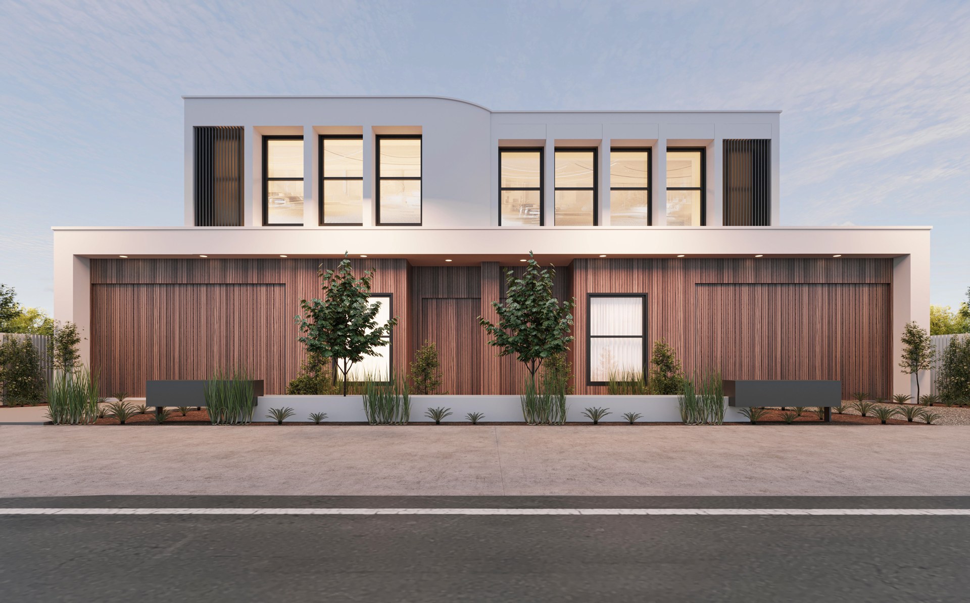Contemporary Australian facade with slim-framed Aluxa aluminium windows at dusk